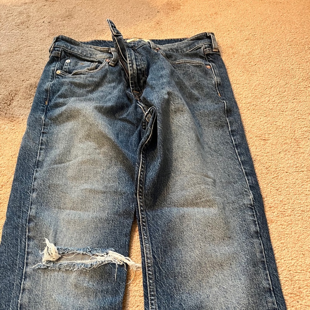 Free People open knee jeans